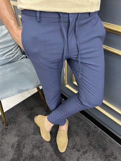 Bel İp Detaylı Slim Fit Kumaş Pantolon ürünü JEANS CLOTHING kategorisinde sizleri bekliyor.